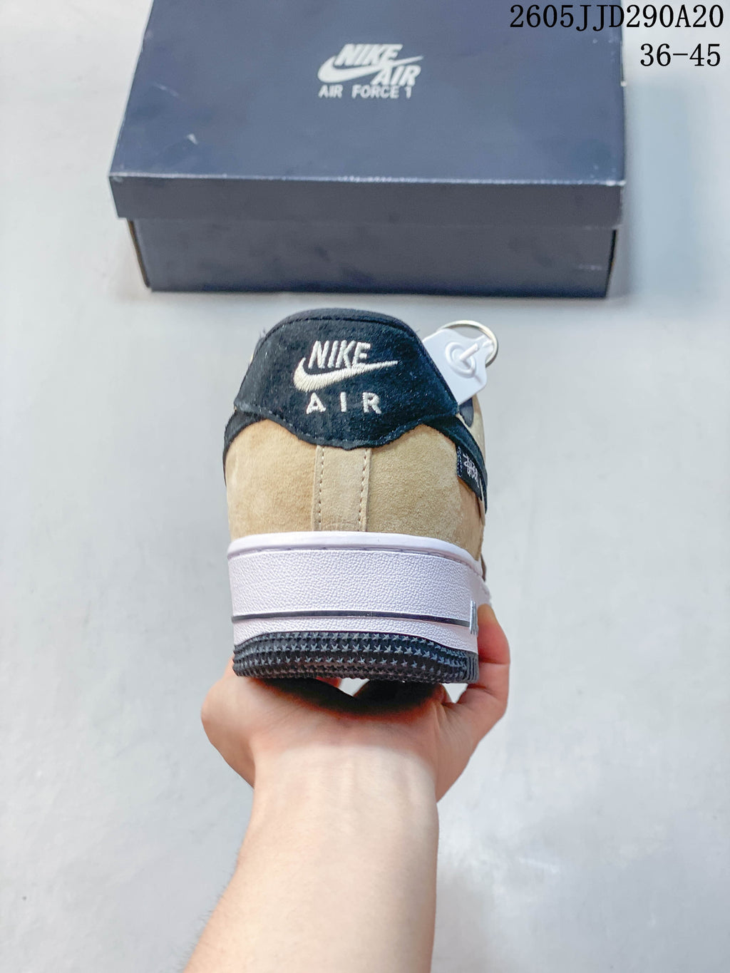 Rear view of a Nike Air Force 1 Shadow sneaker showing layered heel panels