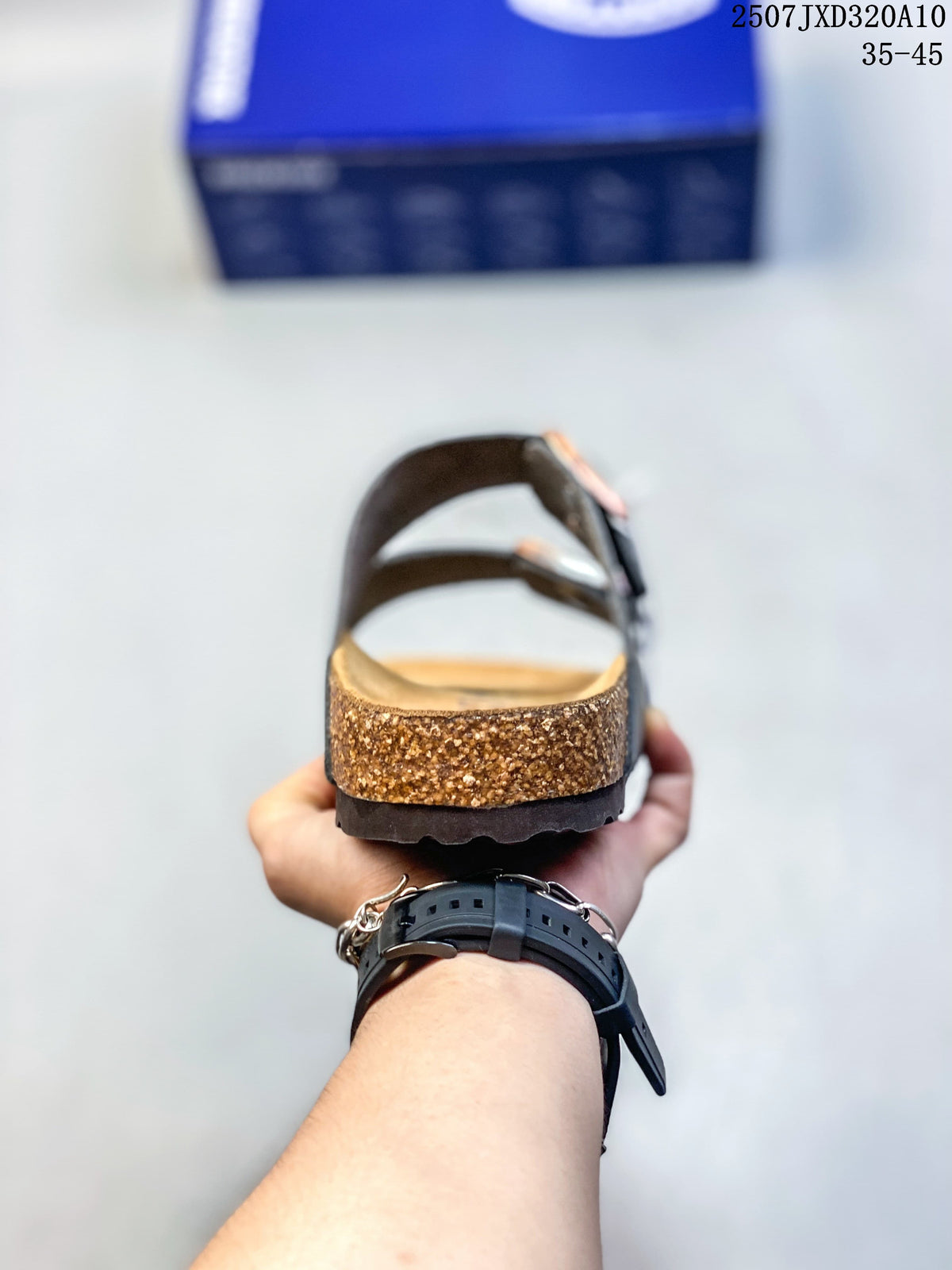 Side view showing the sandal's contoured footbed and layered sole.