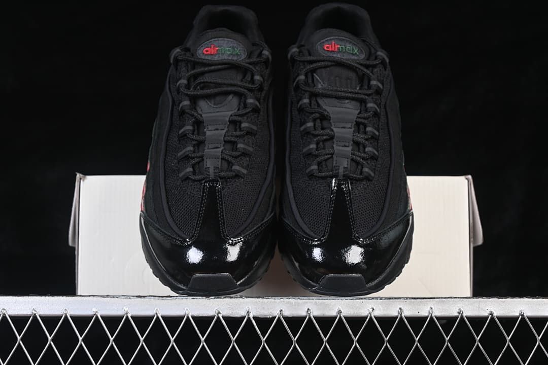 Front view of the pair showing glossy black toe panels