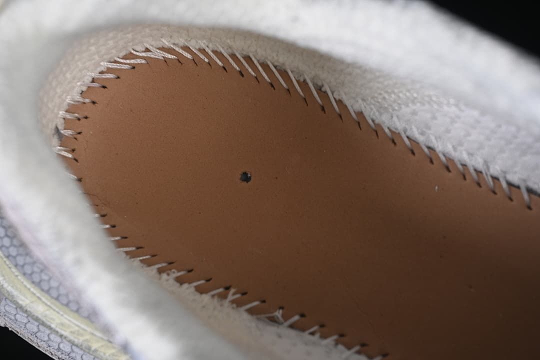 Close-up of stitching inside the sneaker.