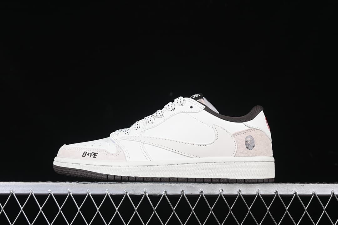 Side profile of the white low-top sneaker with pale heel overlay