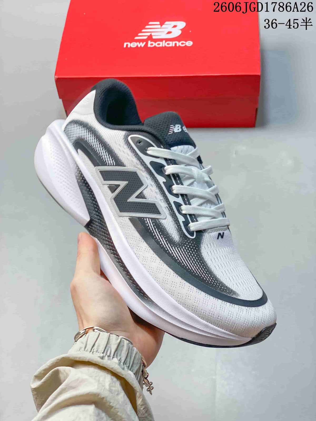 Side view of a white and dark gray New Balance Ellipse V1 low-top running shoe.