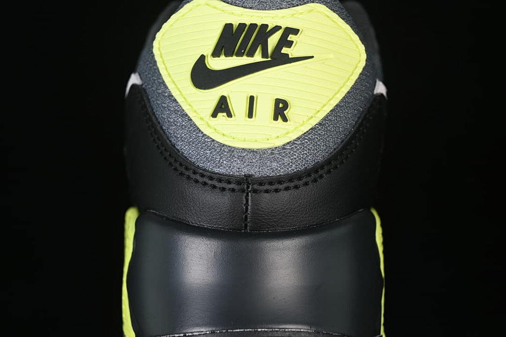 Heel detail with volt Nike Air branding.