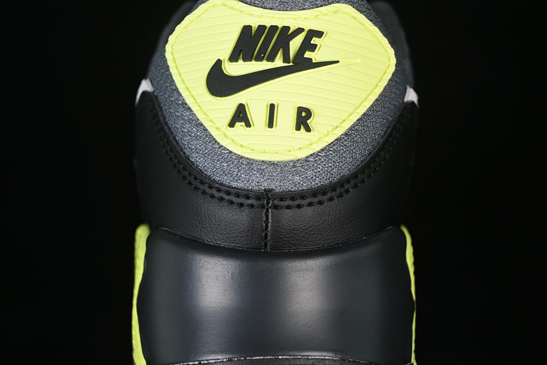 Heel detail with volt Nike Air branding.