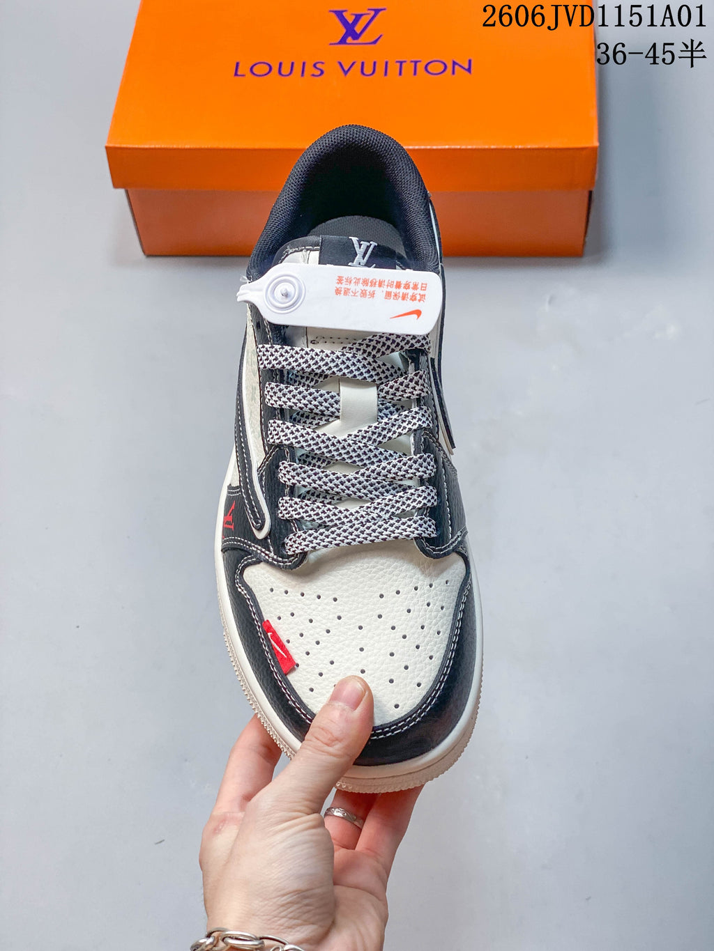 Top view showing perforated toe, patterned laces, and red accents