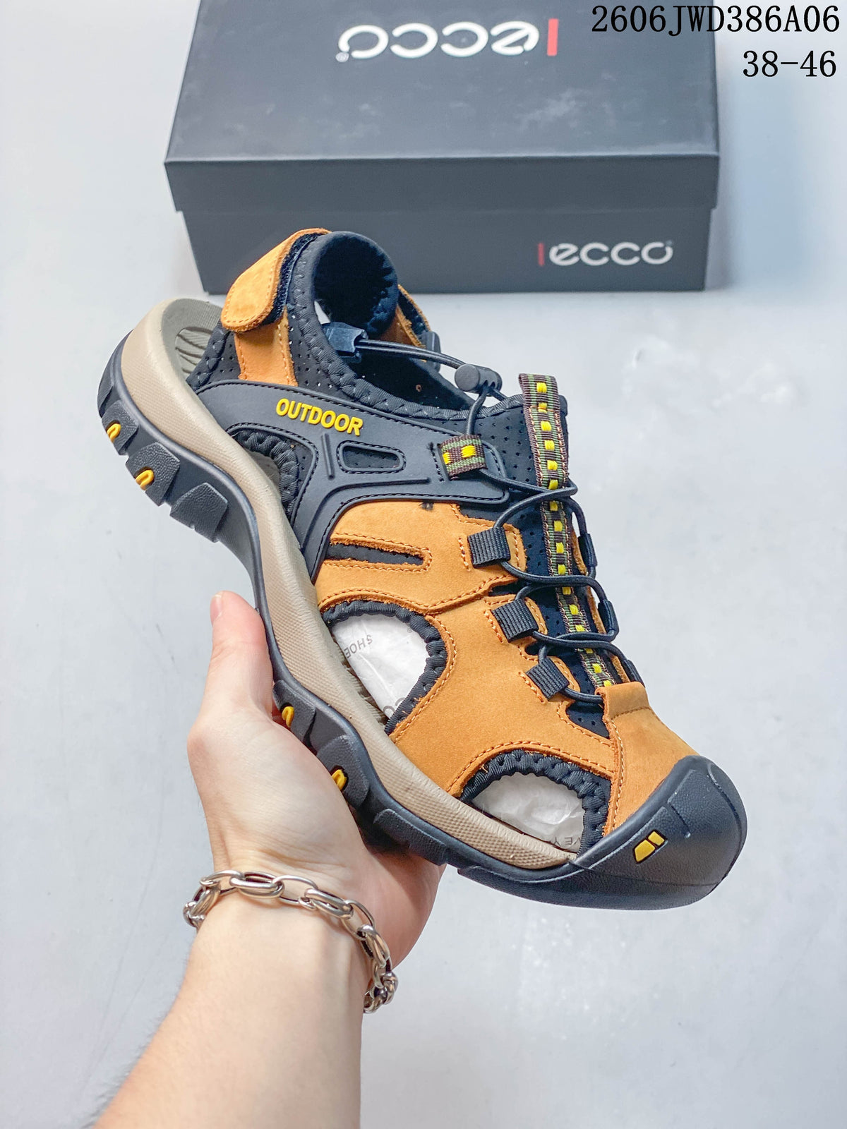 Side view of a navy and orange ECCO closed-toe sandal with adjustable fastening.