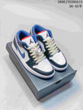 Pair of white, blue, gray, and red-accent Jordan low-top sneakers on a shoebox