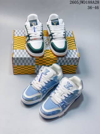 Green-and-white and blue-and-white low-top sneakers arranged on patterned boxes.
