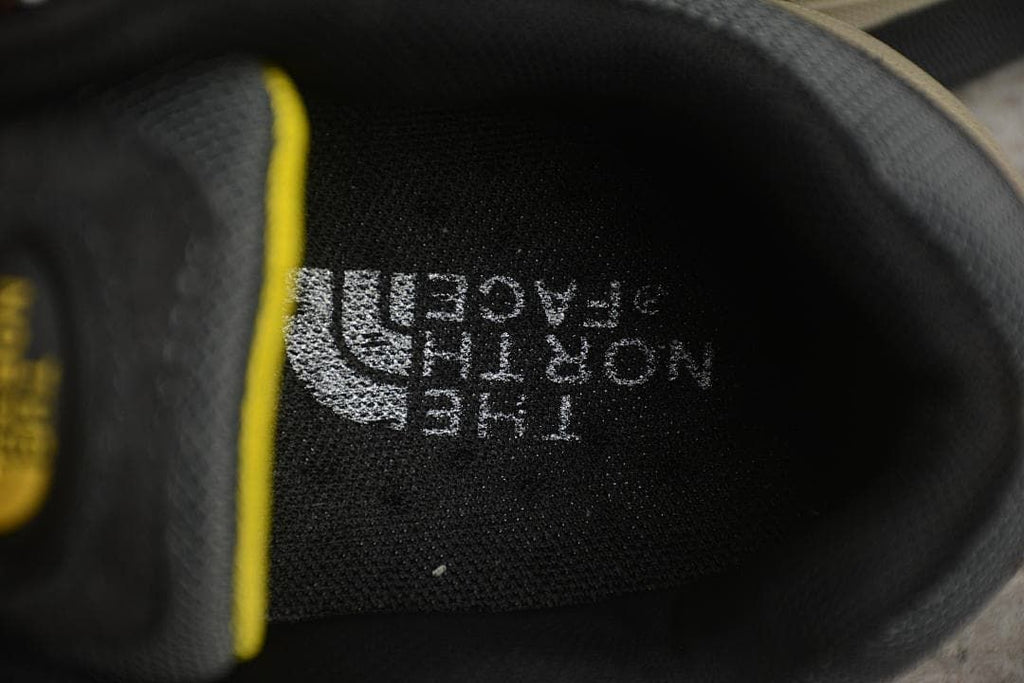 Close-up of the shoe's black padded interior with The North Face logo.