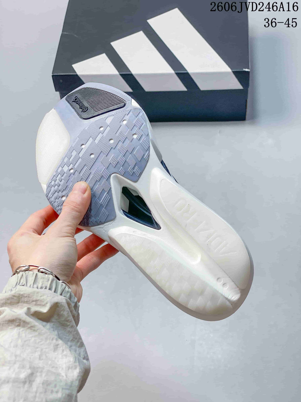 Close-up of the shoe's outsole, showing its patterned tread and sculpted sole