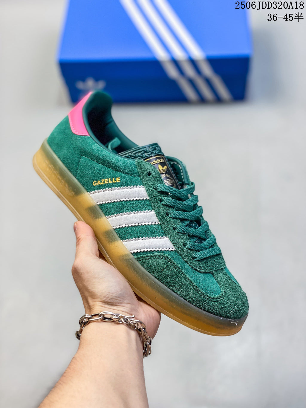Green Adidas Gazelle low-top sneaker with white stripes and a gum-look sole