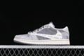 Side view of gray and white low-top sneakers with a printed side detail