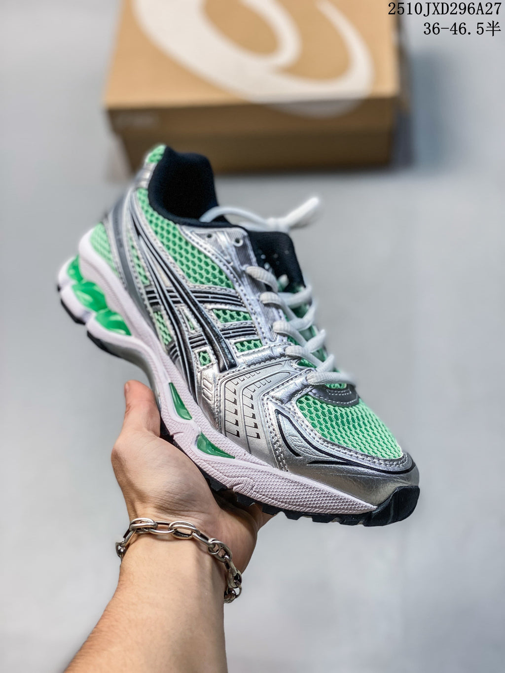 Silver and green mesh running sneaker with white laces.