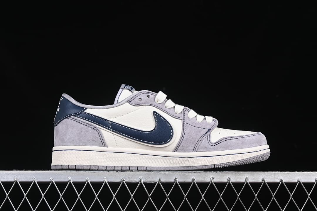 Side profile showing navy Swoosh and layered panels