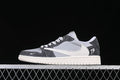 Side view of grey and charcoal low-top sneakers with a light-colored oversized Swoosh