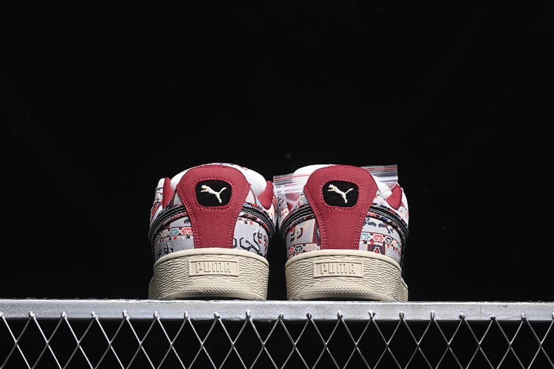 Rear view of the pair showing burgundy heel panels and textured cream soles