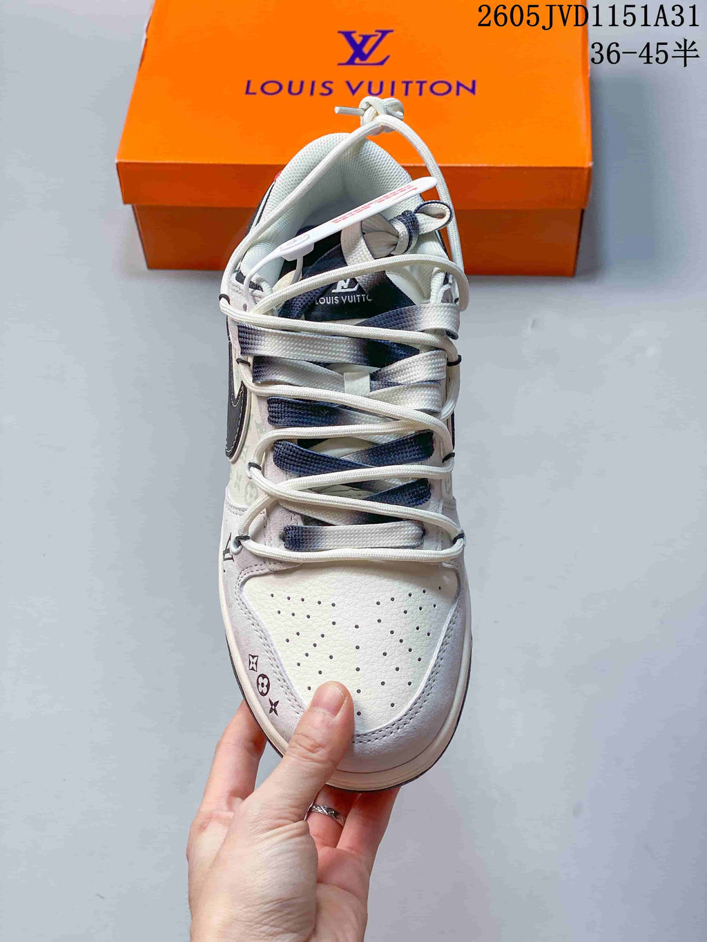 Top view highlighting the perforated toe, layered laces, and patterned upper.
