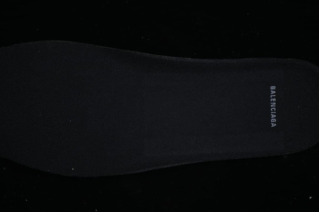 Black insole with Balenciaga branding.