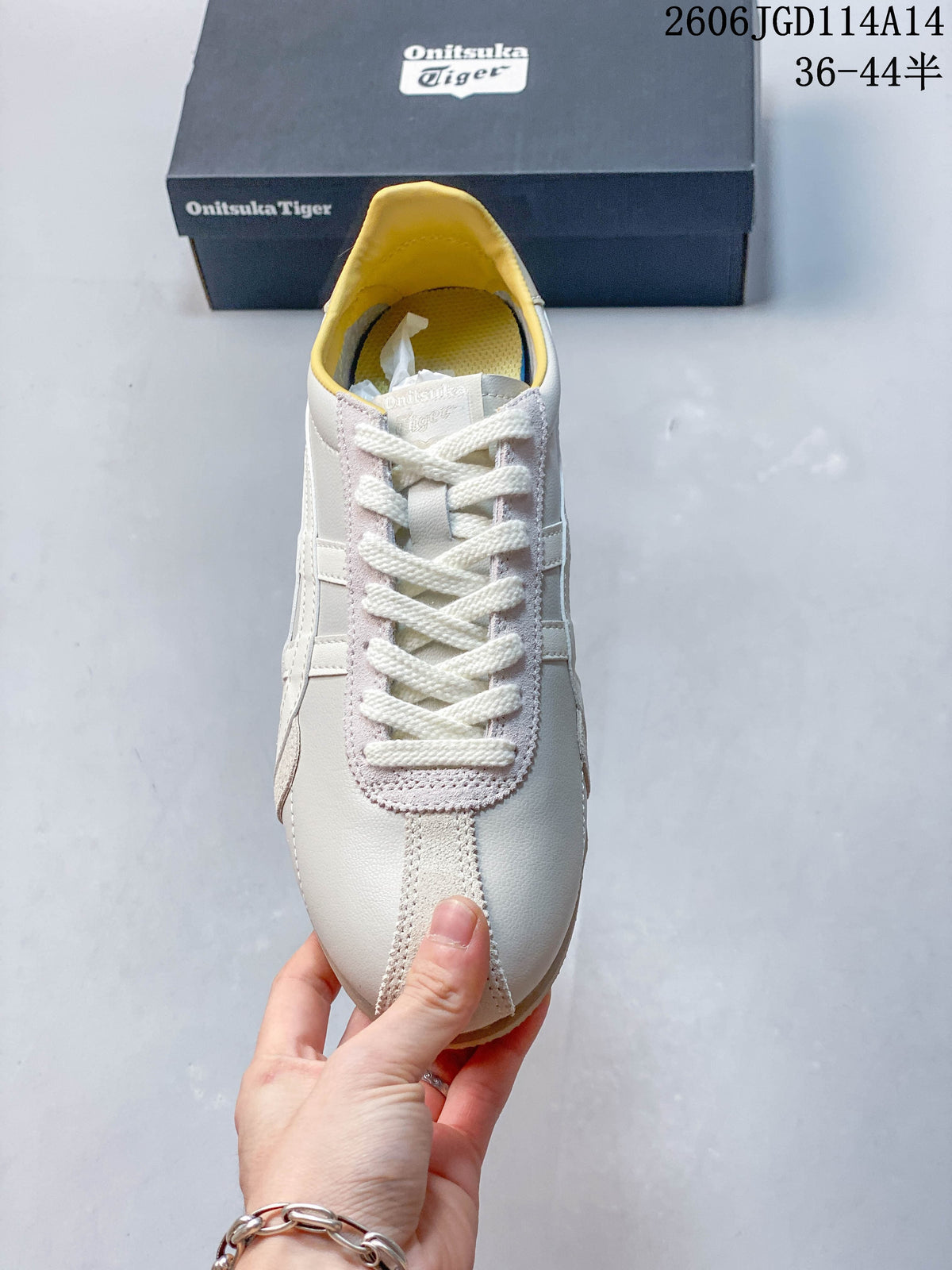 Front view of a lace-up Onitsuka Tiger Runspark sneaker with pale yellow lining