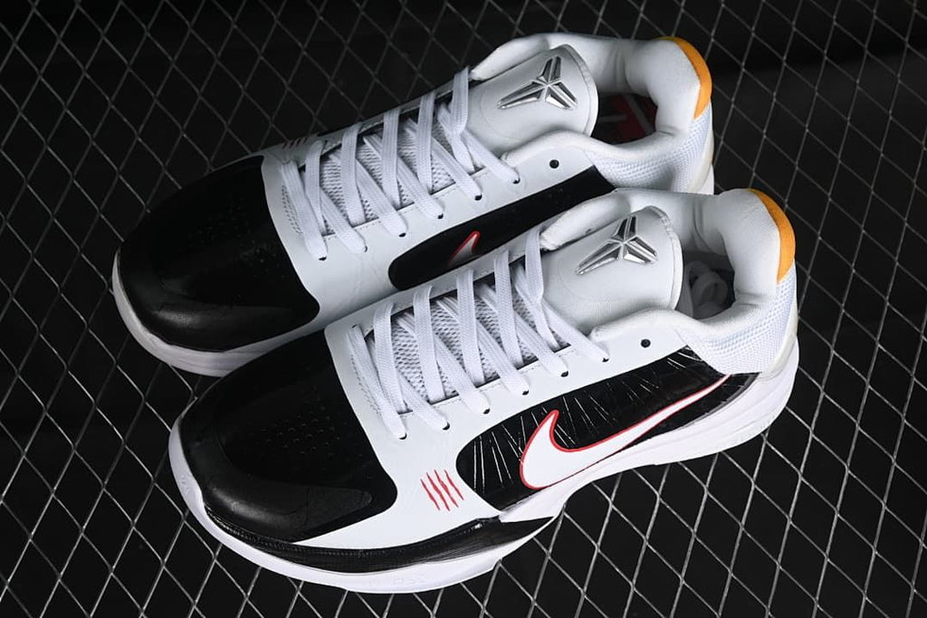 Pair of white and black Kobe 5 Protro shoes shown from above