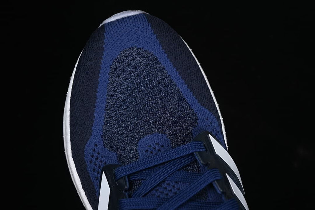 Top view of the blue knit-style toe and lacing.