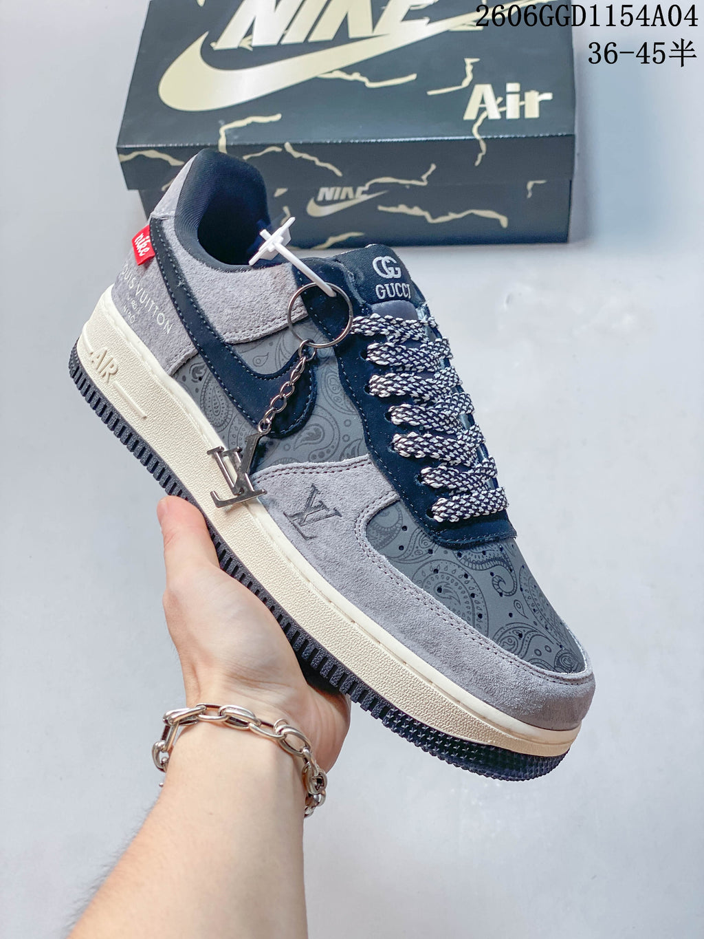 Angled side view of the sneaker with decorative charm and patterned panels