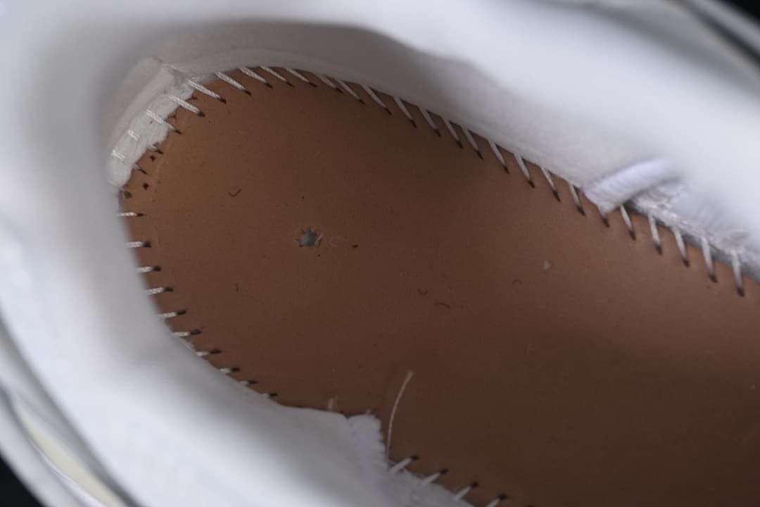 Interior stitching and footbed detail