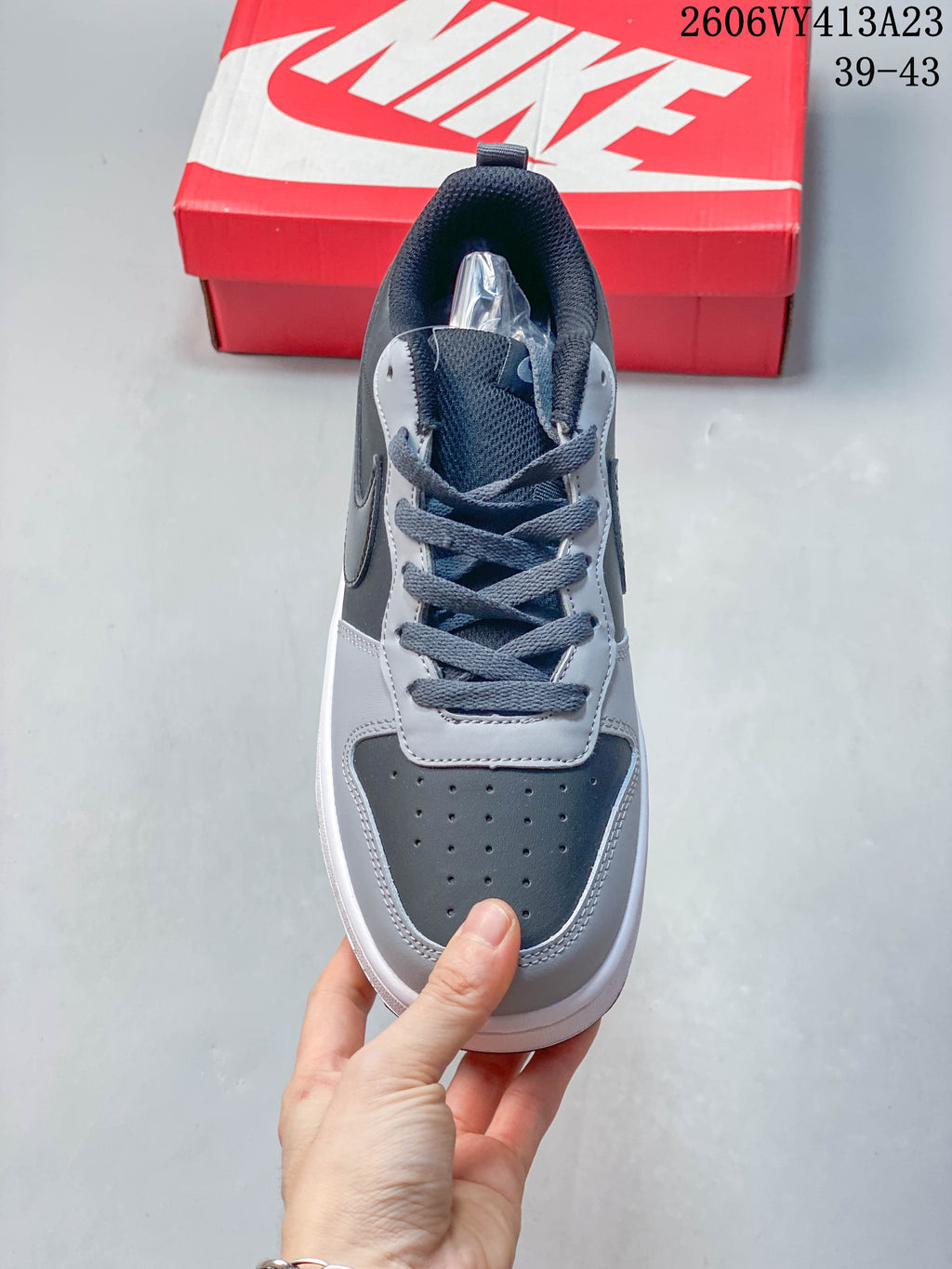 Top view showing the lace-up front and perforated toe panel of a NikeCourt Borough 2 sneaker