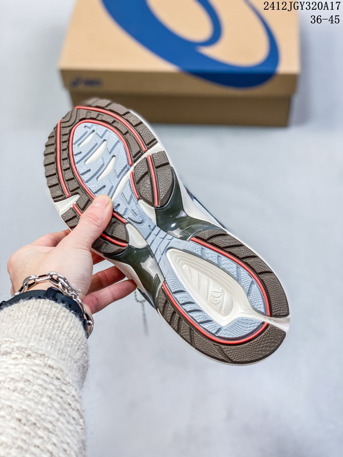 Close-up of the sneaker outsole with patterned tread and contrasting accents