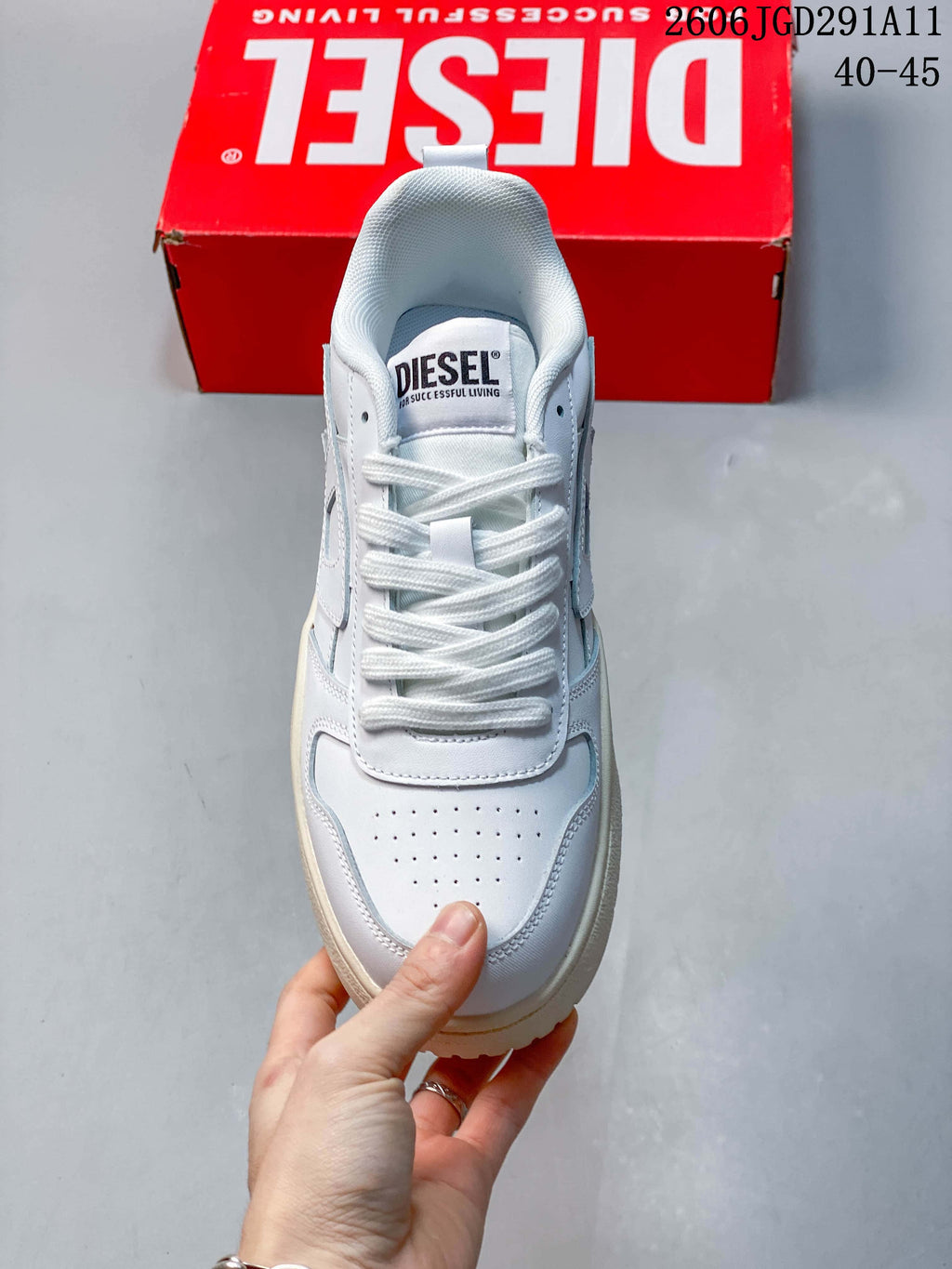 Top view showing the laces and perforated toe panel.