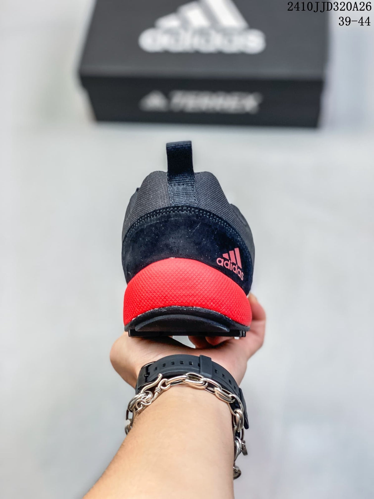 Rear view of the shoe showing the red heel accent and heel pull loop