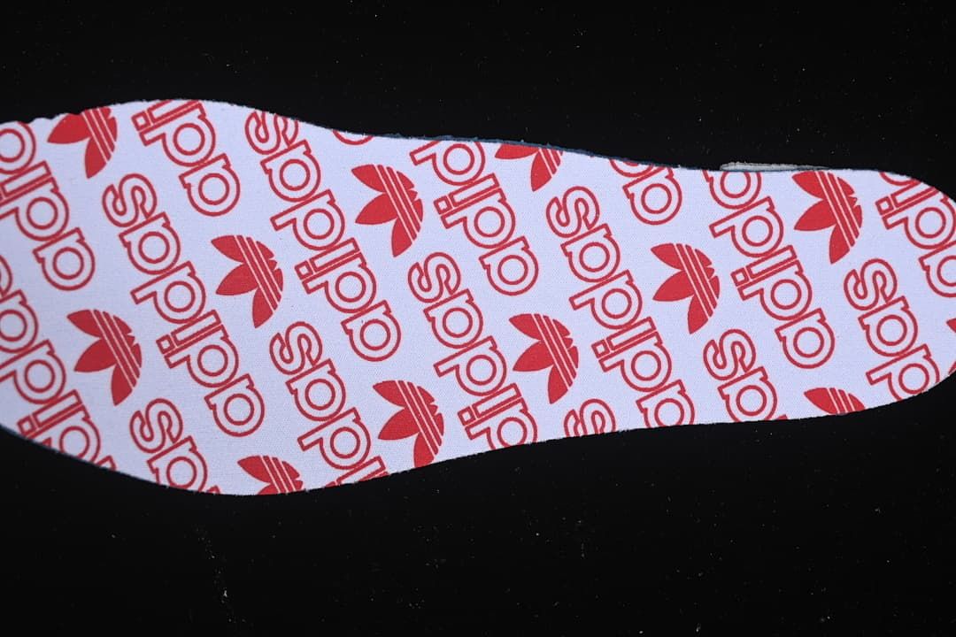 Printed adidas-patterned insole surface