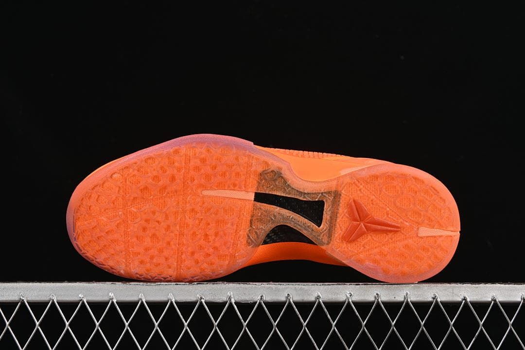 Outsole view showing translucent orange tread