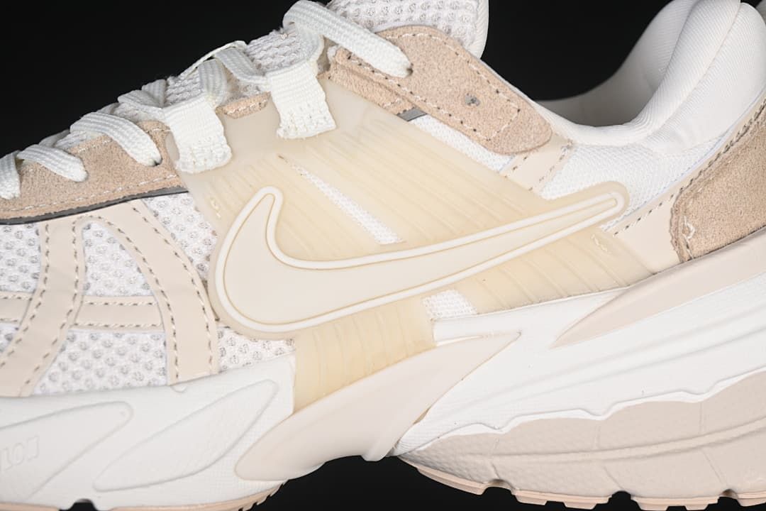 Close-up of side Swoosh and layered shoe panels