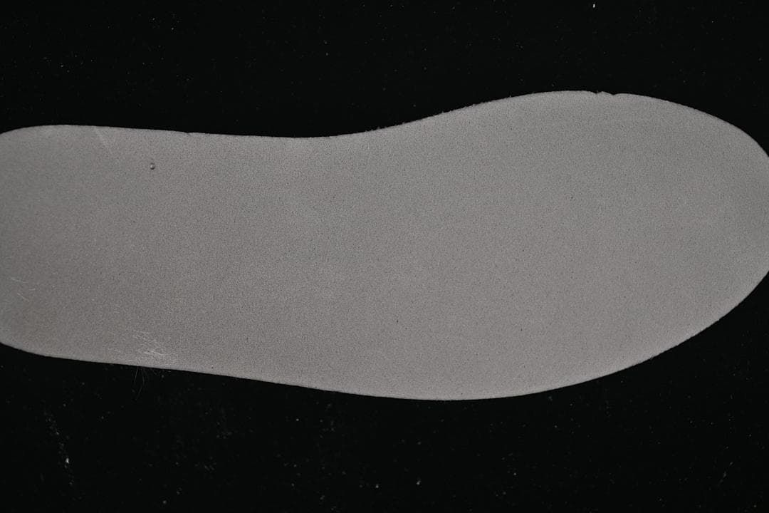 Close-up of a light-colored shoe insole.