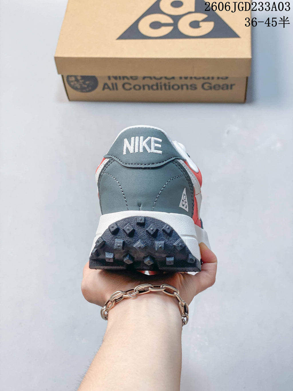 Rear view of a Nike ACG LDV shoe showing the gray heel and lugged outsole