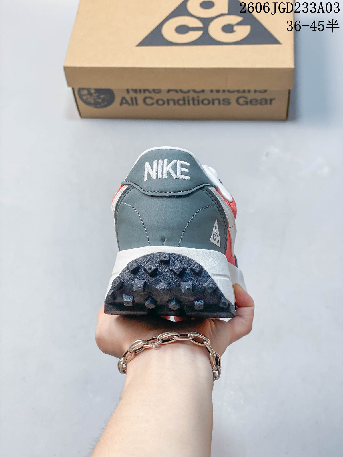 Rear view of a Nike ACG LDV shoe showing the gray heel and lugged outsole