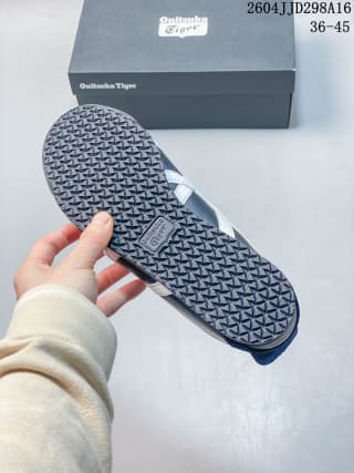 Bottom view showing the repeating textured rubber outsole pattern.