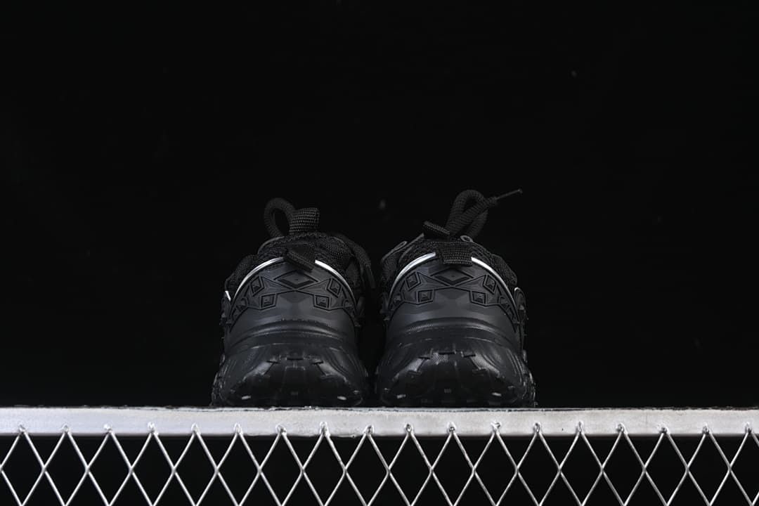 Rear view of the pair showing the heel details and chunky soles.