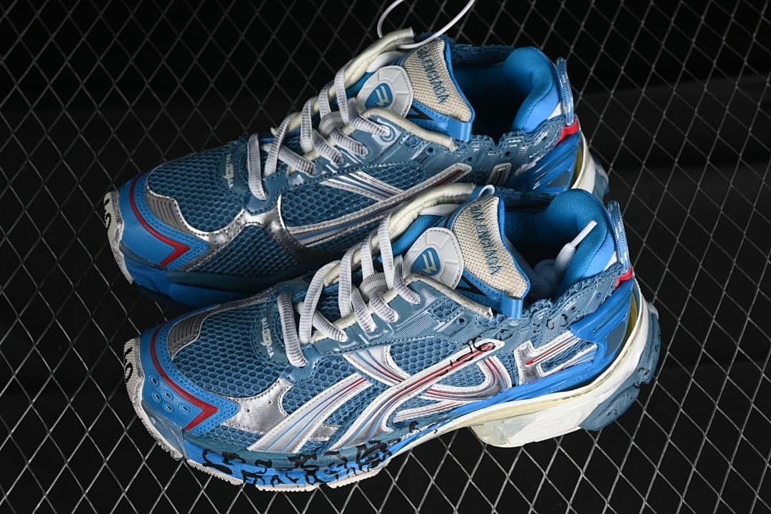 Pair of blue and silver Runner sneakers shown at an angle