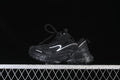 Black children's chunky sneakers shown in side profile with silver-tone accents.