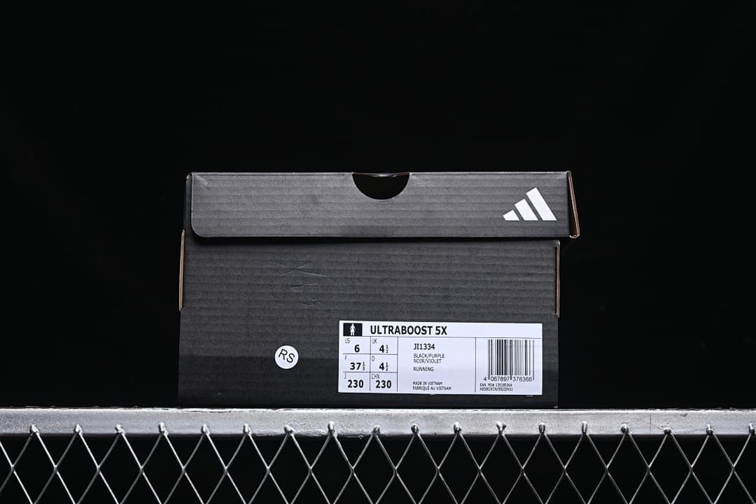 Shoe box label identifies Ultraboost 5X, style code JI1334, and Black/Purple color.