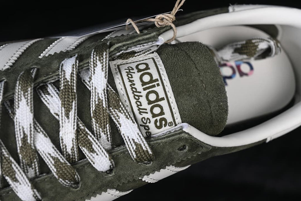Close-up of the Handball Spezial tongue label and patterned laces