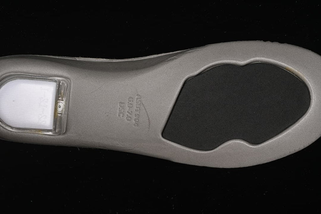 Close-up view of the sneaker outsole and its textured sections