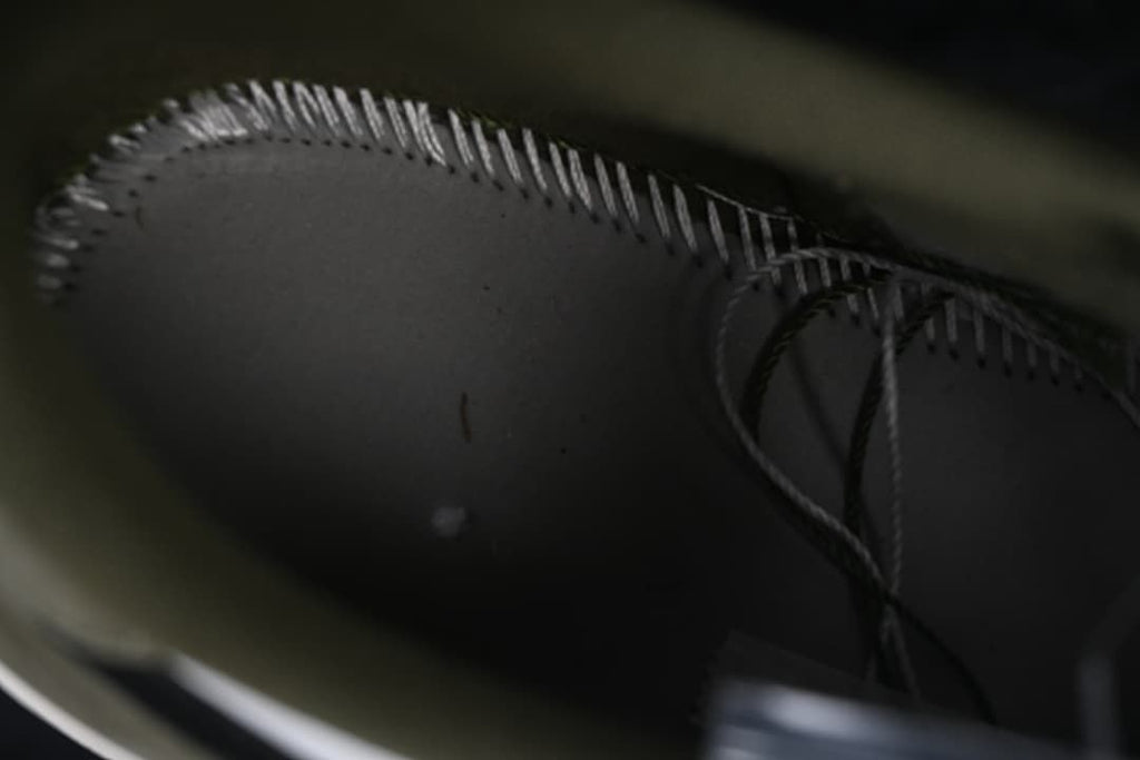 Interior stitching detail inside the sneaker