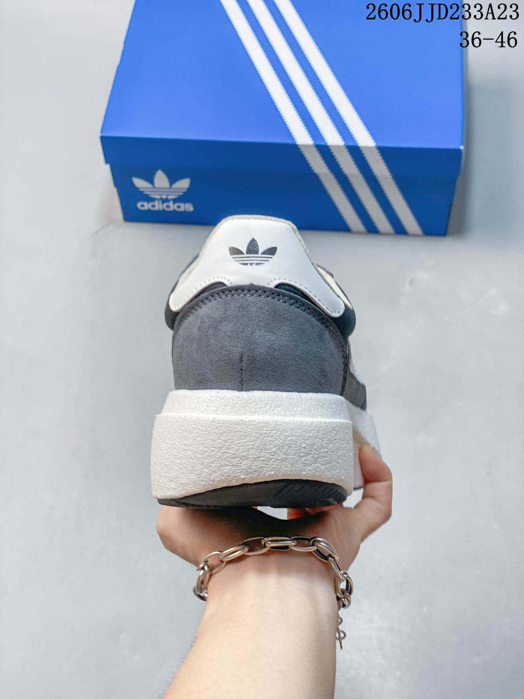 Rear view showing the white heel tab and raised white midsole