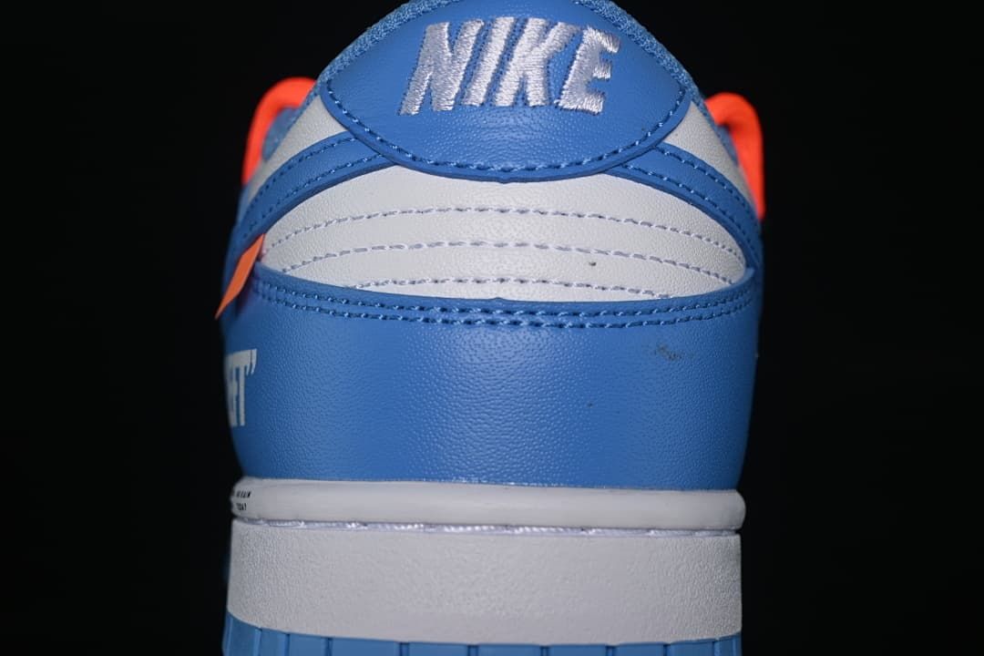 Rear view showing blue heel panels and Nike branding.