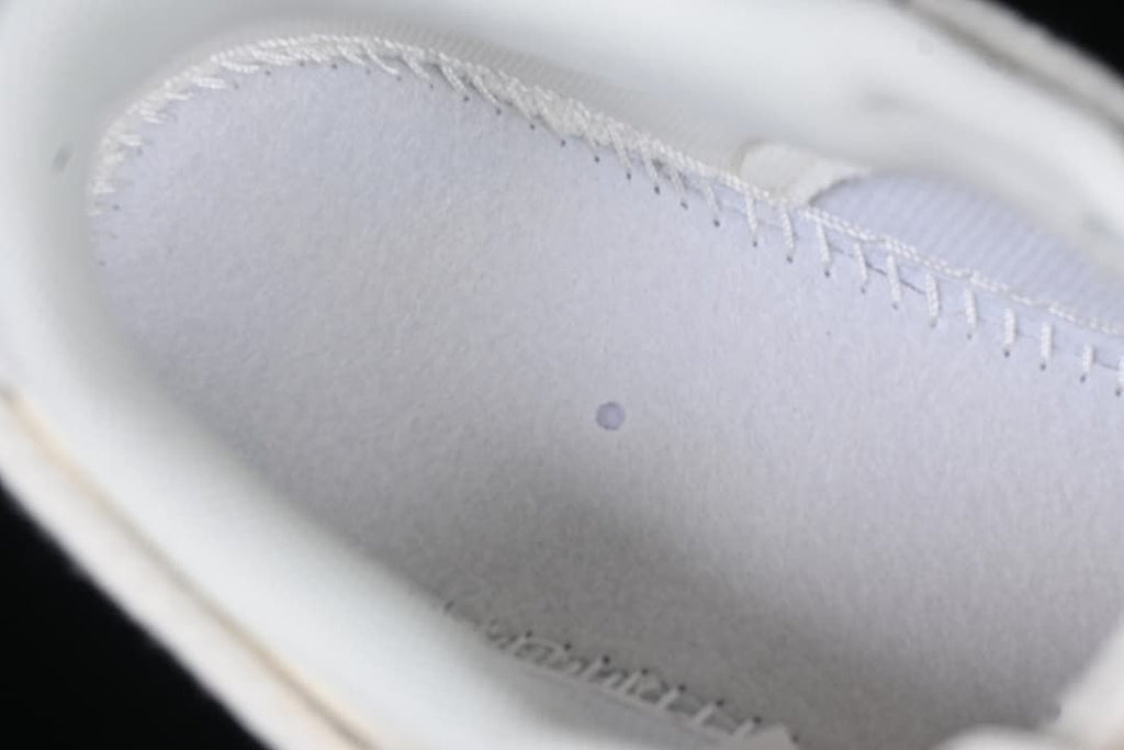 Close-up of the light-colored inner shoe lining