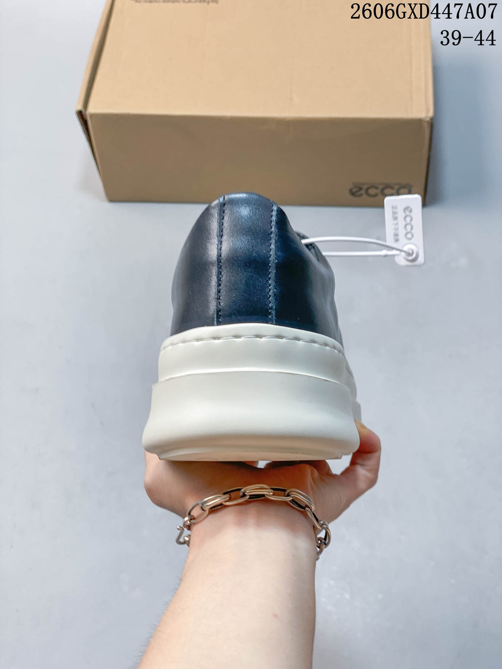 Rear view showing the thick white platform sole