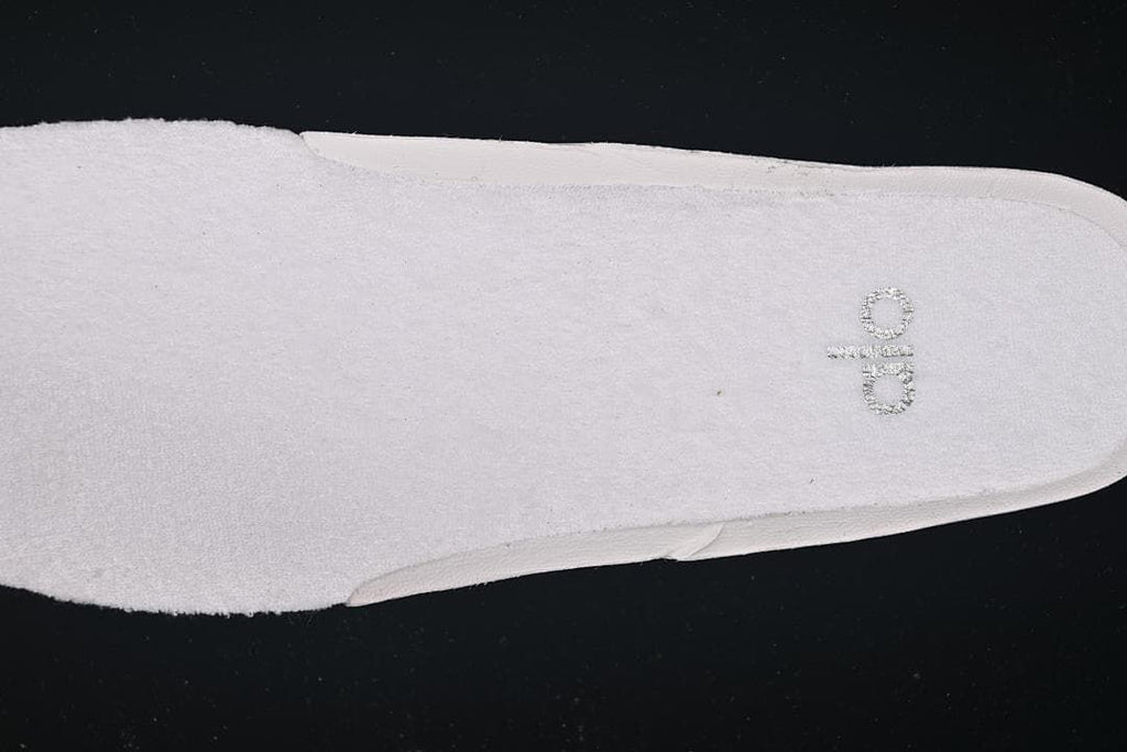 Close-up of the insole with Alo branding
